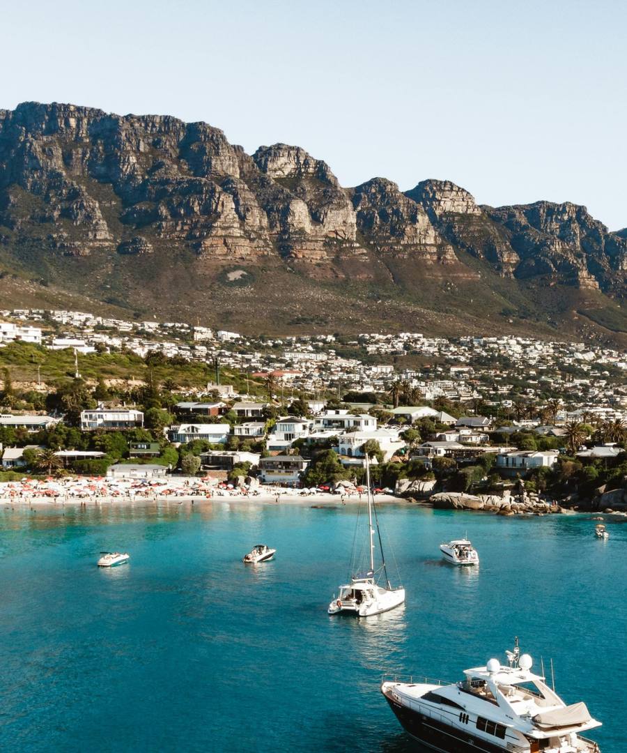 Yachts anchored off Clifton beach below the Twelve Apostles